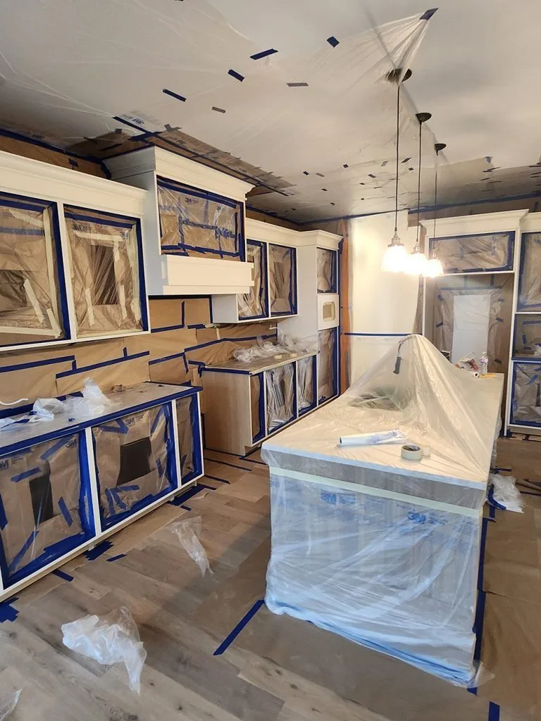 Ottawa kitchen before cabinet painting - cabinets masked and ready for spray finish
